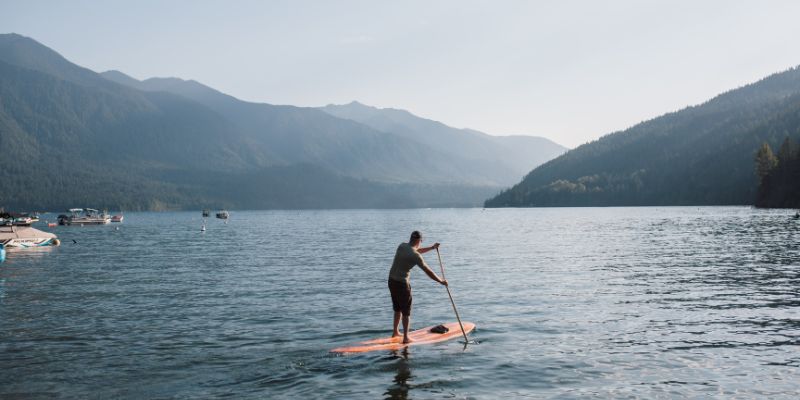 A paddler on a stand-up-paddle board enjoying Cultus Lake.