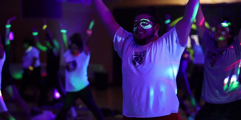 UFV students enjoying a glow-in-the-dark yoga session