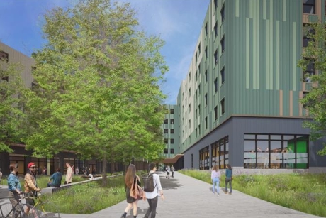 A rendering of Building J with people entering the building