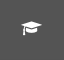 White grad cap on a dark grey background.