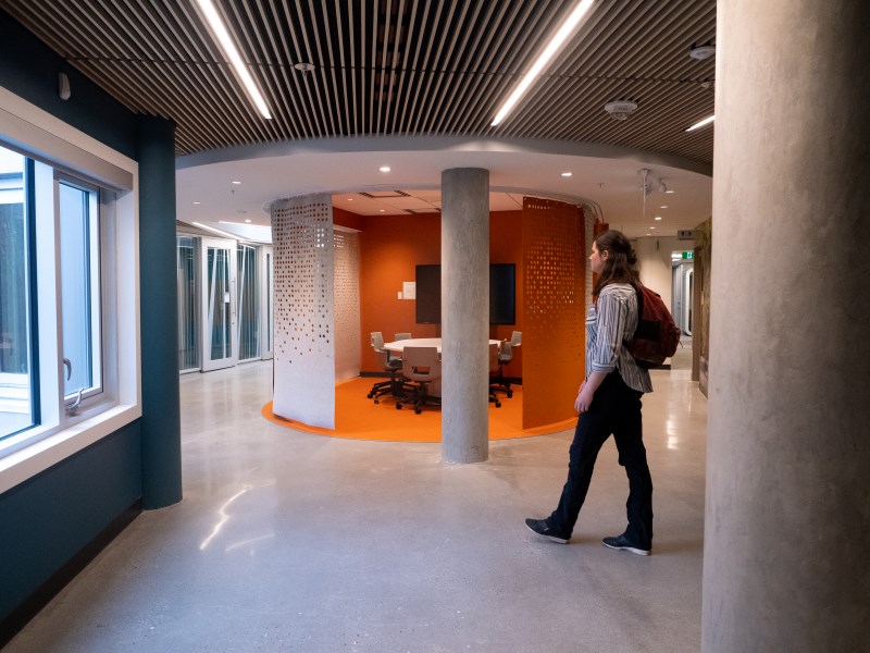 A student walks down the hallway