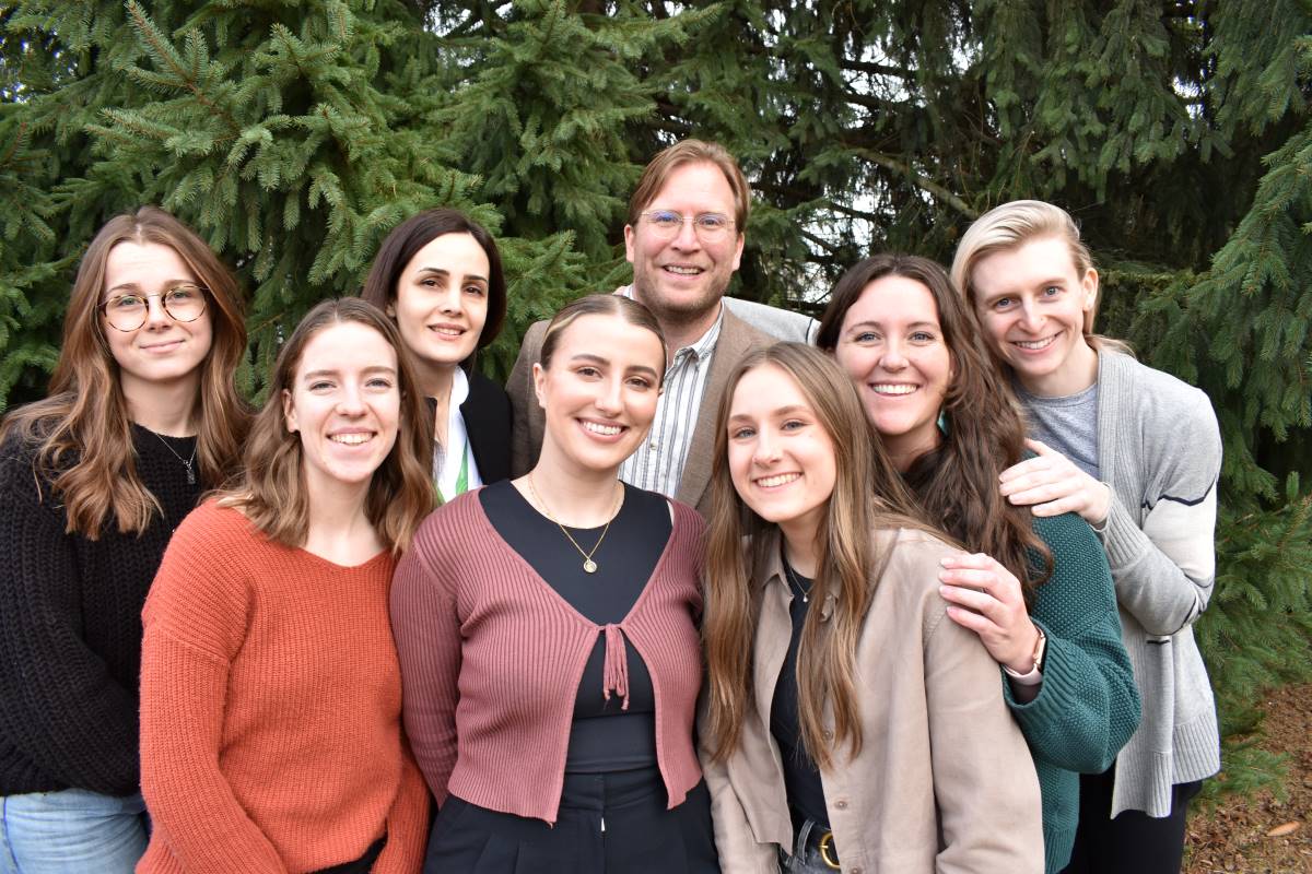The Sustainability team -- including student workers -- poses outside.