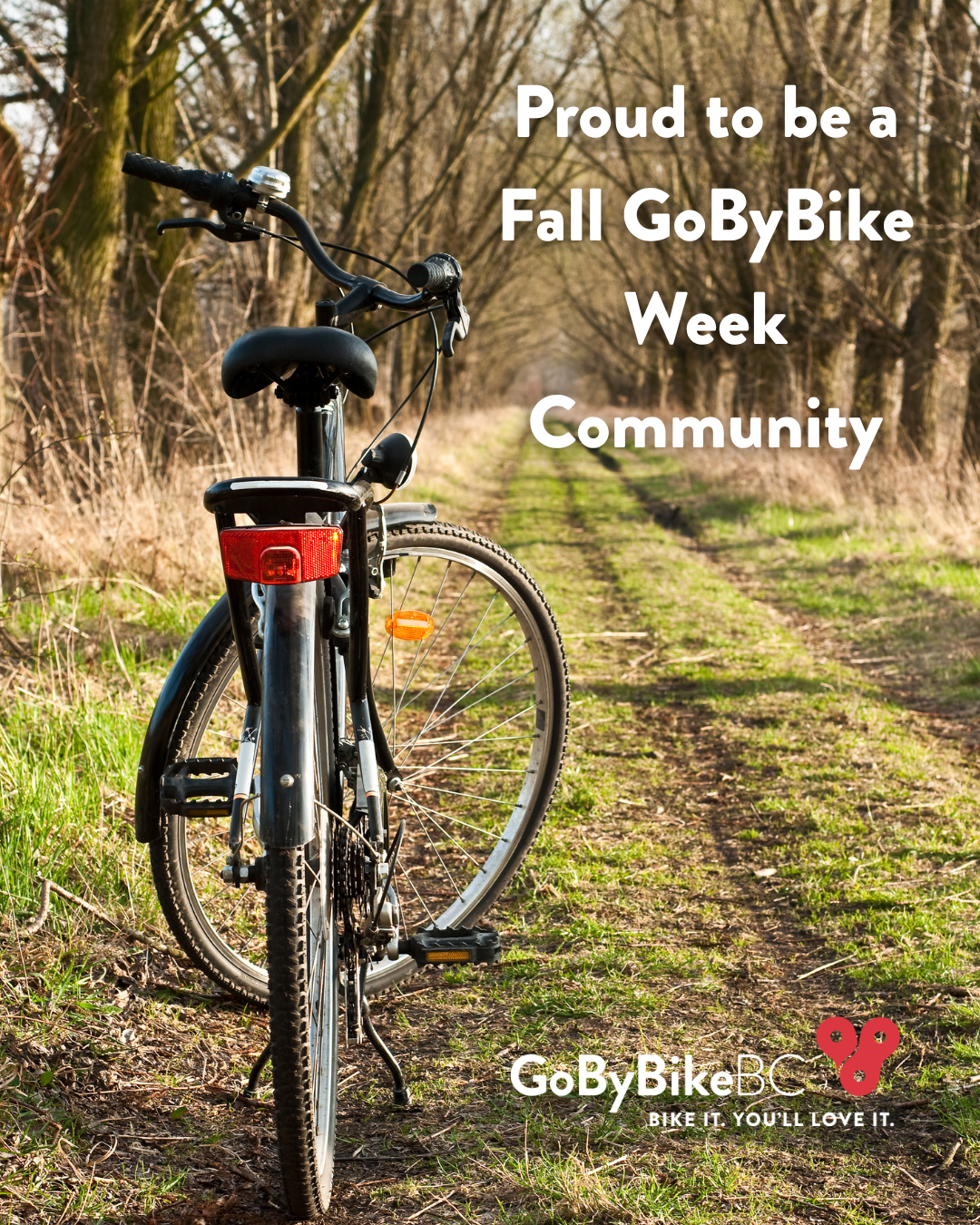 A bike on a grassy pathway during autum with the words 